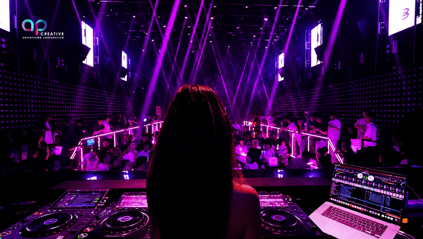 DJ performing over a packed dance floor at BSK Club Manila
